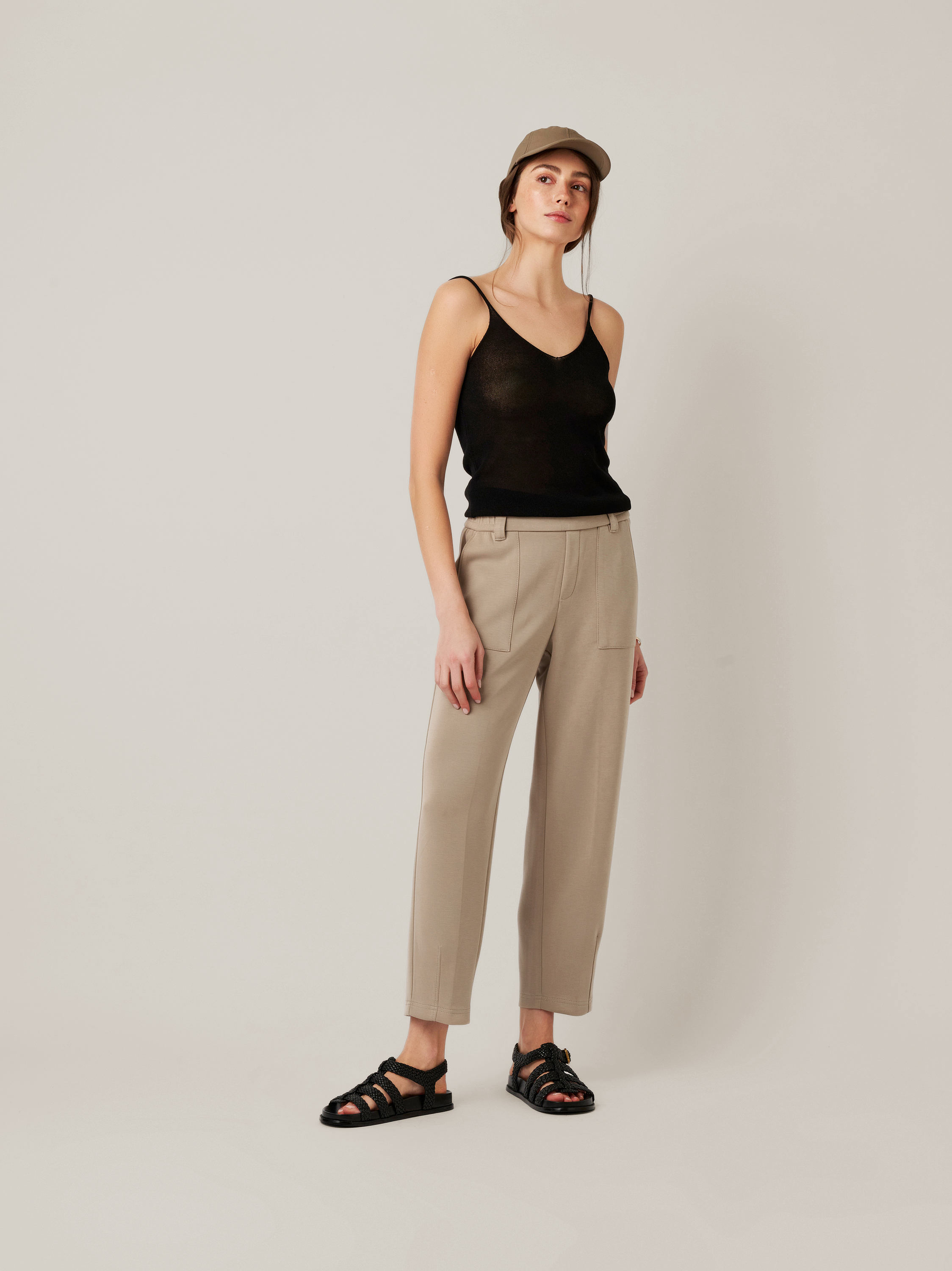 Womens trousers Mara Tapered in taupe, tapered-fit trousers made of scuba, front view worn by model