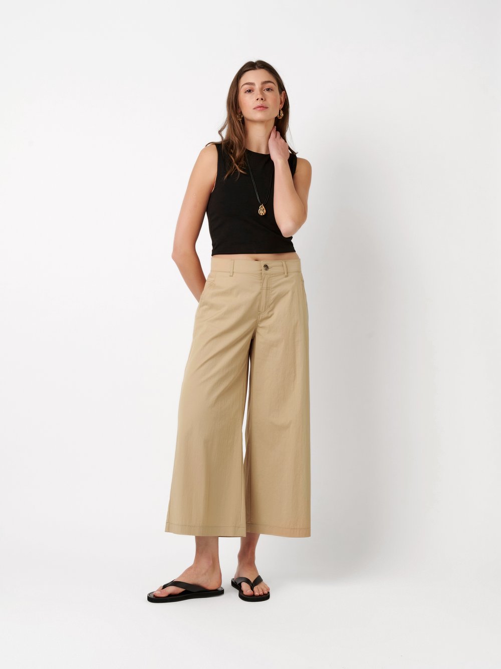 Womens trousers Mara Culotte in sand, culottes made of papertouch cotton, outfit view worn by model