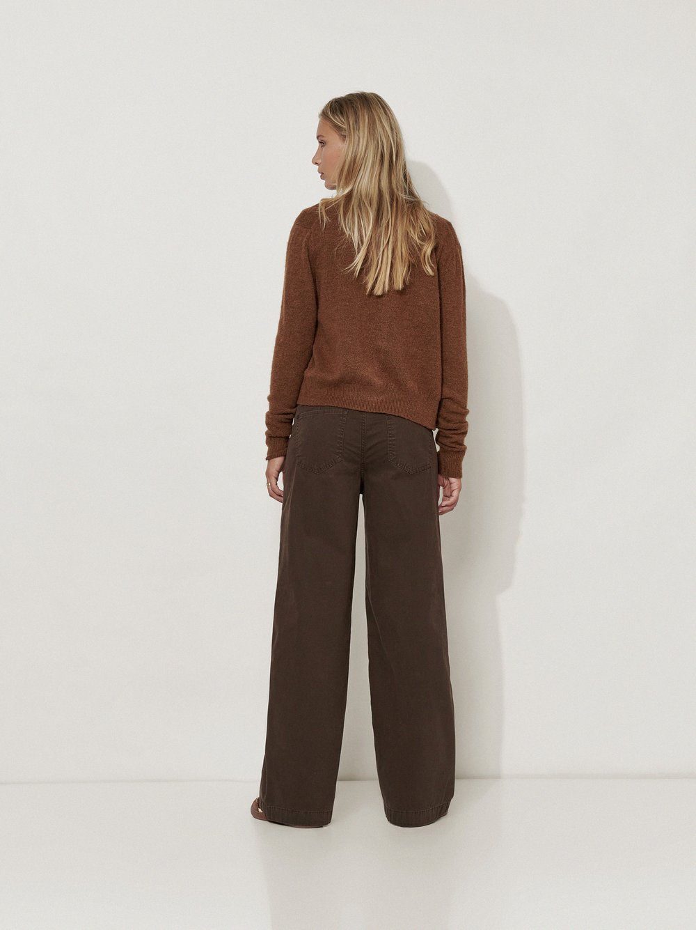 Womens trousers Mara Wide in Dark Brown, wide-leg worker trousers, back view worn by model