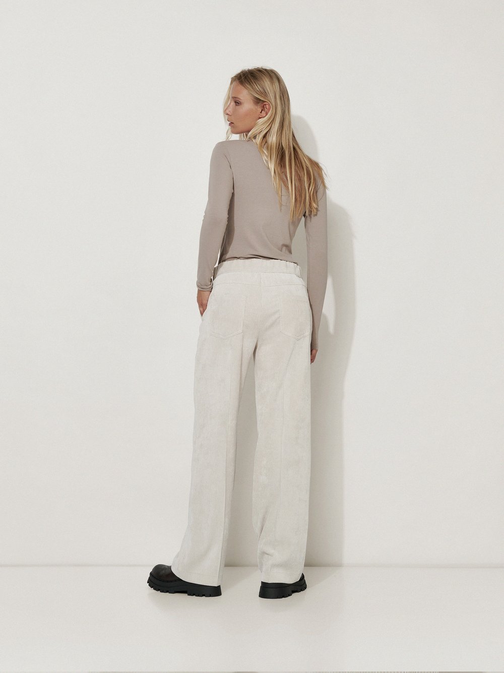 Womens trousers Mara Wide in Ecru, wide-leg corduroy trousers, back view worn by model