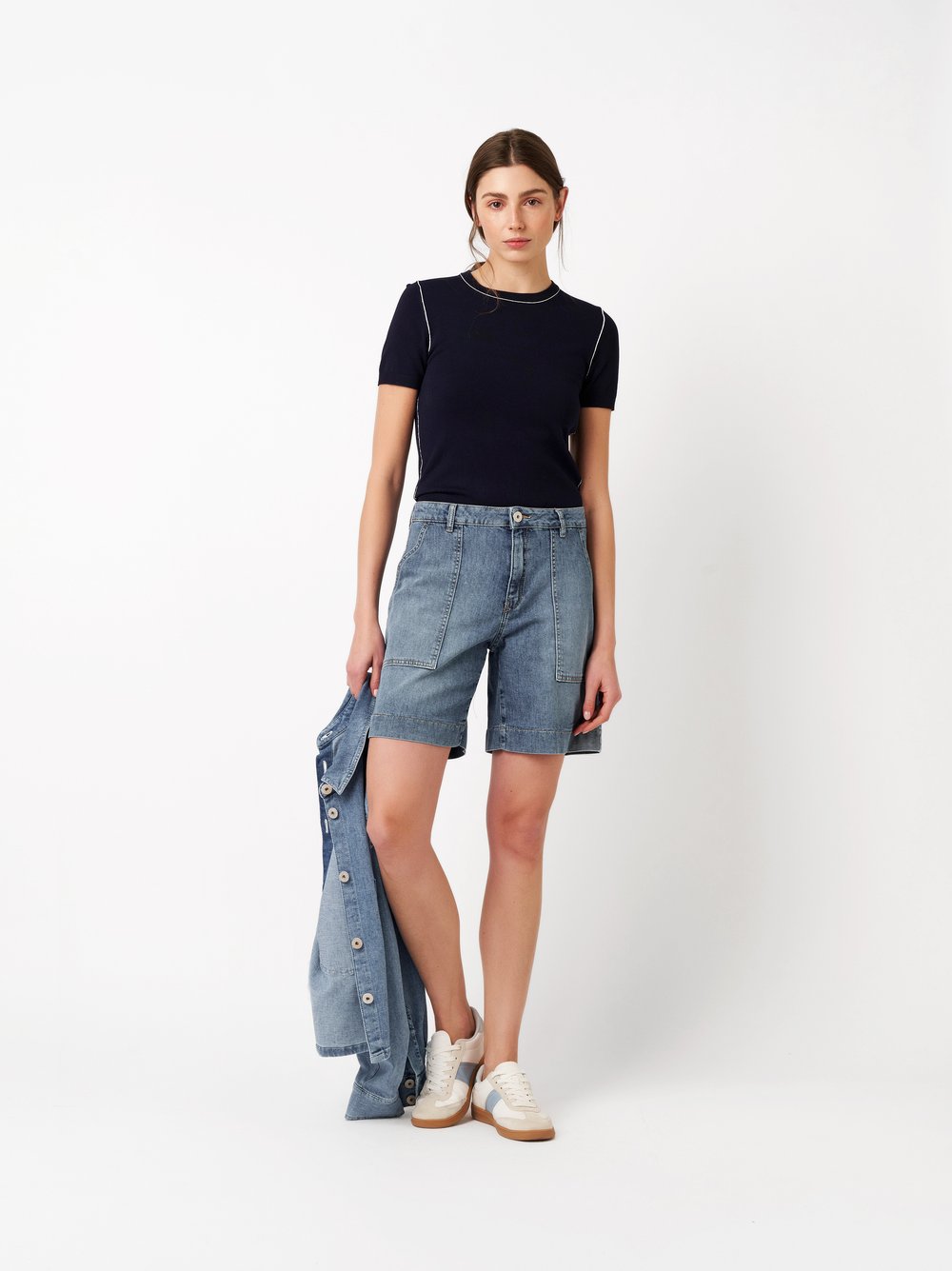 Womens shorts Mara Shorts in mid blue, denim shorts with framed pockets, outfit view worn by model