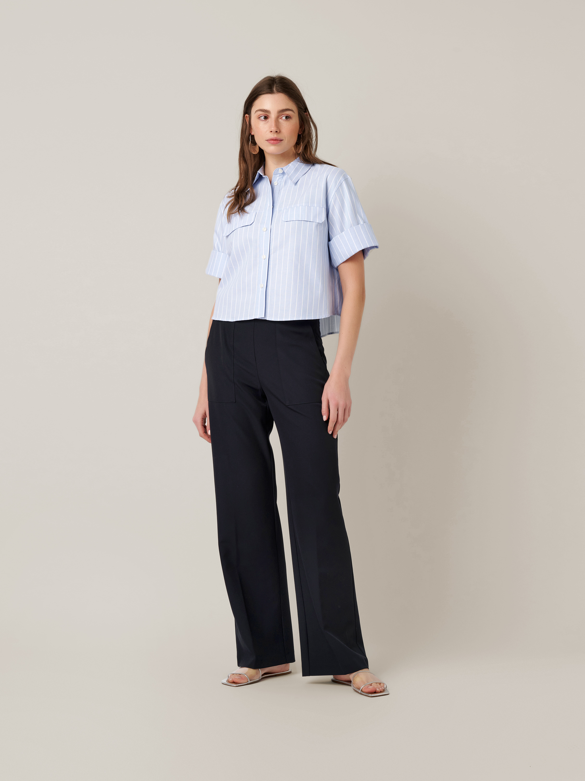 Womens trousers Audrey Wide in navy, fluid crepe trousers with front pockets, front view worn by model