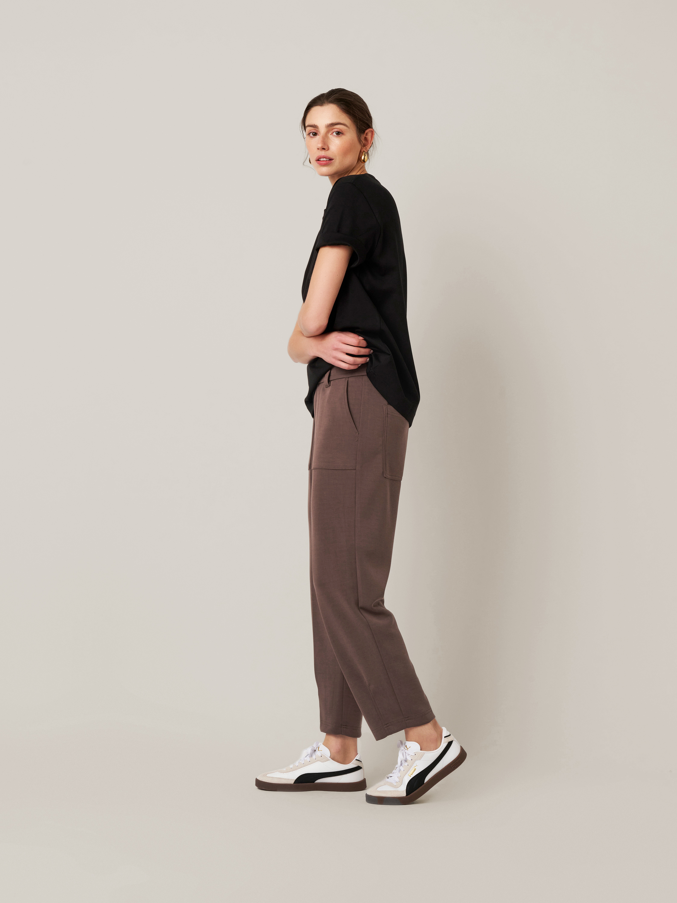 Womens trousers Mara Tapered in brown, tapered-fit trousers made of scuba, outfit view worn by model