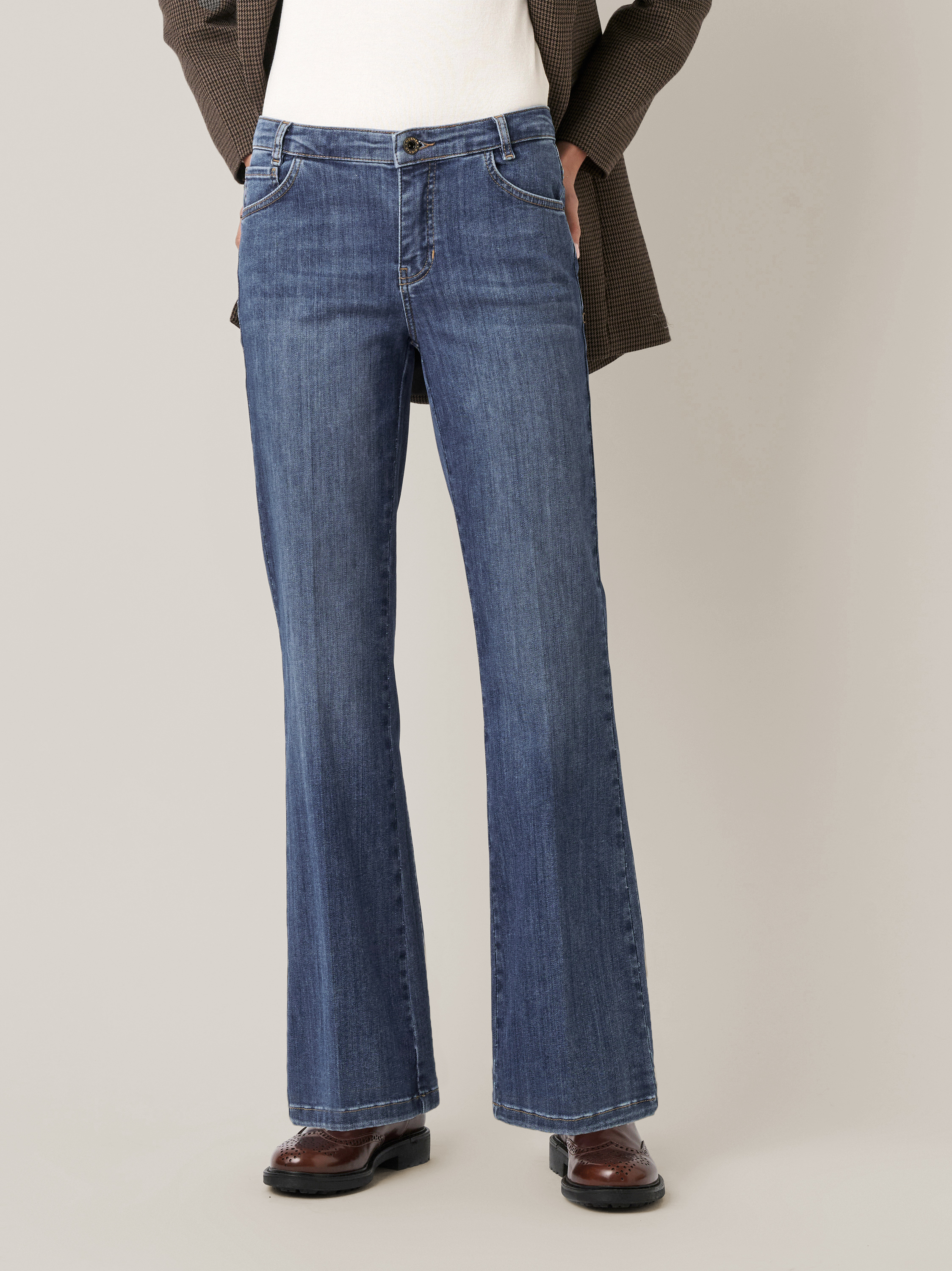 Womens jeans Antonia_341 in mid blue, bootcut jeans with pleats, front view worn by model