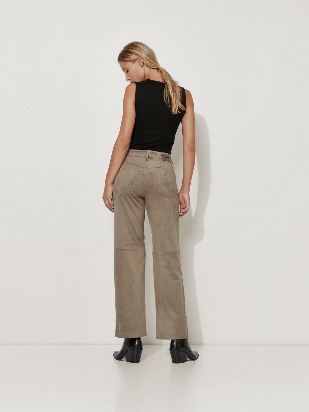 Womens trousers Audrey Straight in Taupe, straight-fit trousers in suede look, back view worn by model