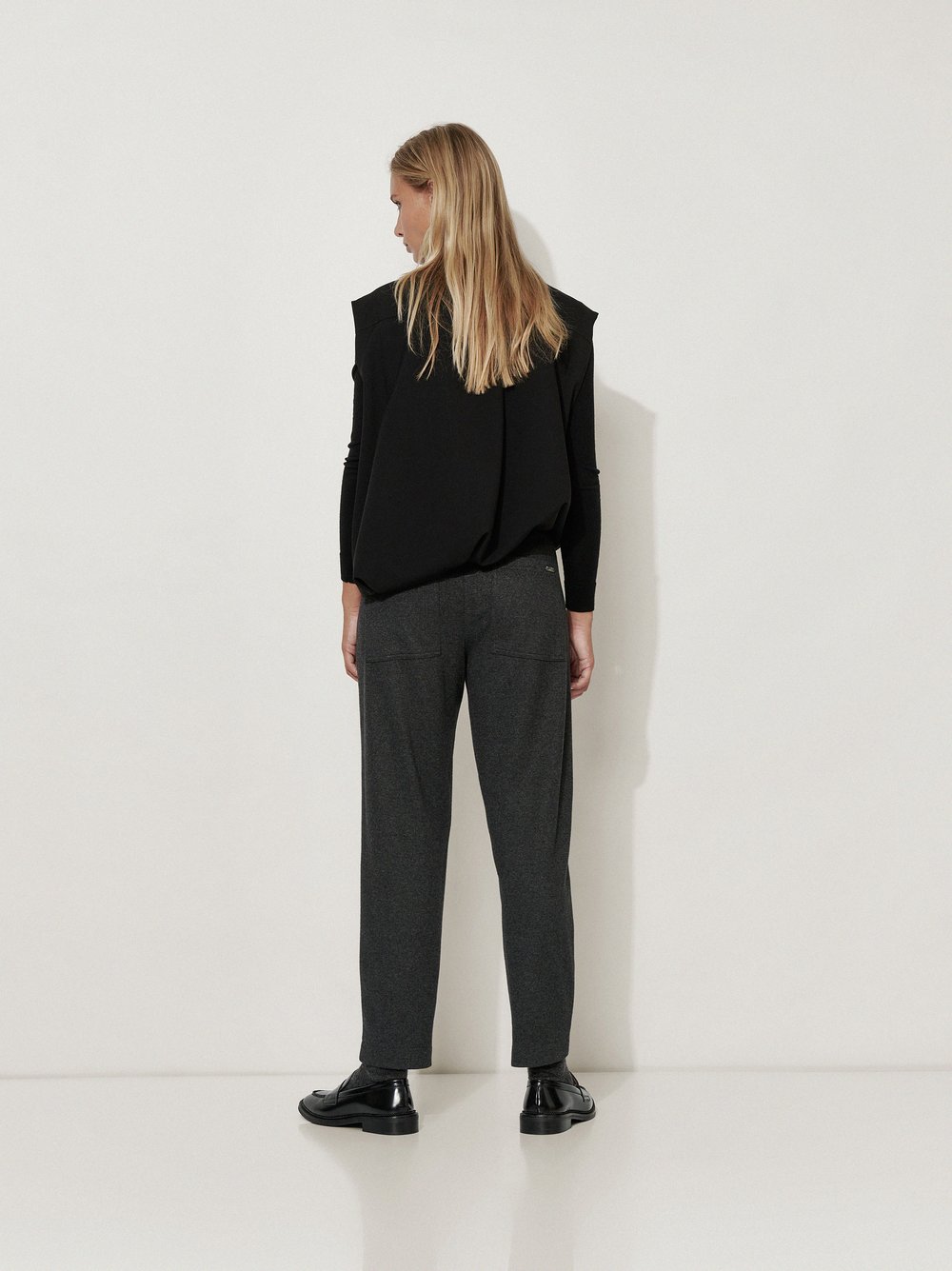 Womens trousers Mara Tapered in Anthracite, soft jersey tapered-fit trousers, back view worn by model