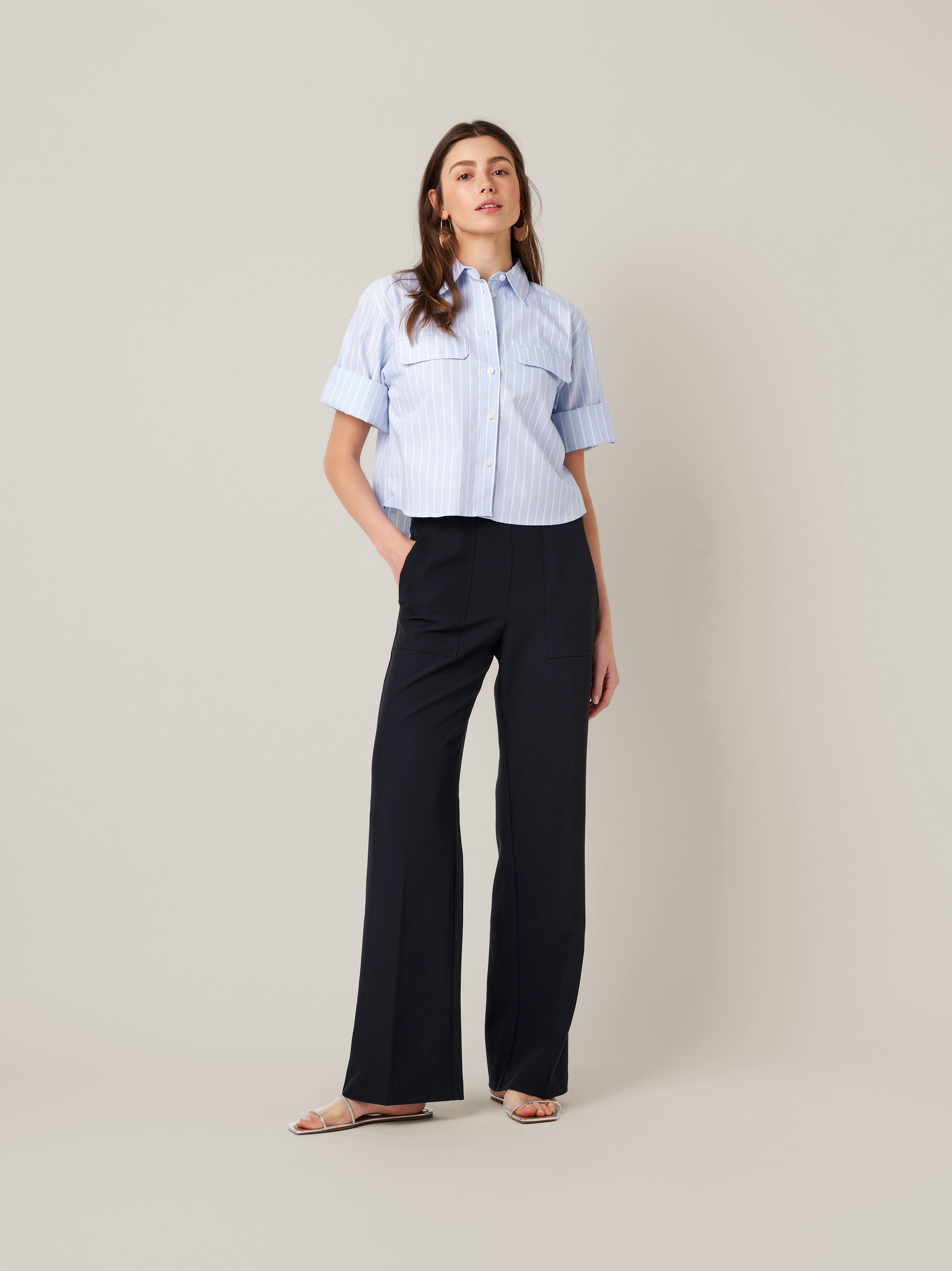 Womens trousers Audrey Wide in navy, fluid crepe trousers with front pockets, outfit view worn by model