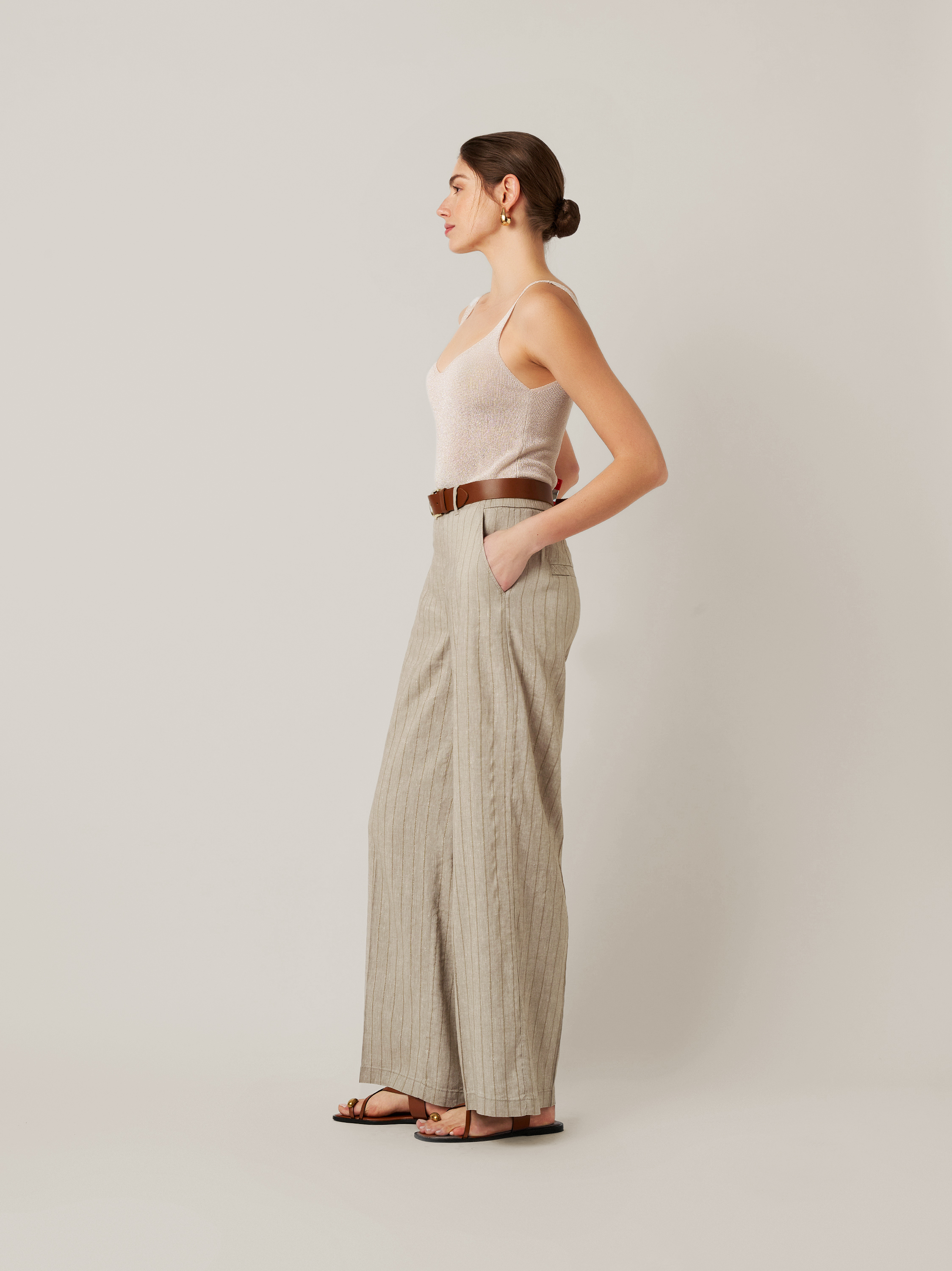 Womens trousers Mara Wide in khaki / gold, linen trousers with subtly shimmering stripes, front view worn by model