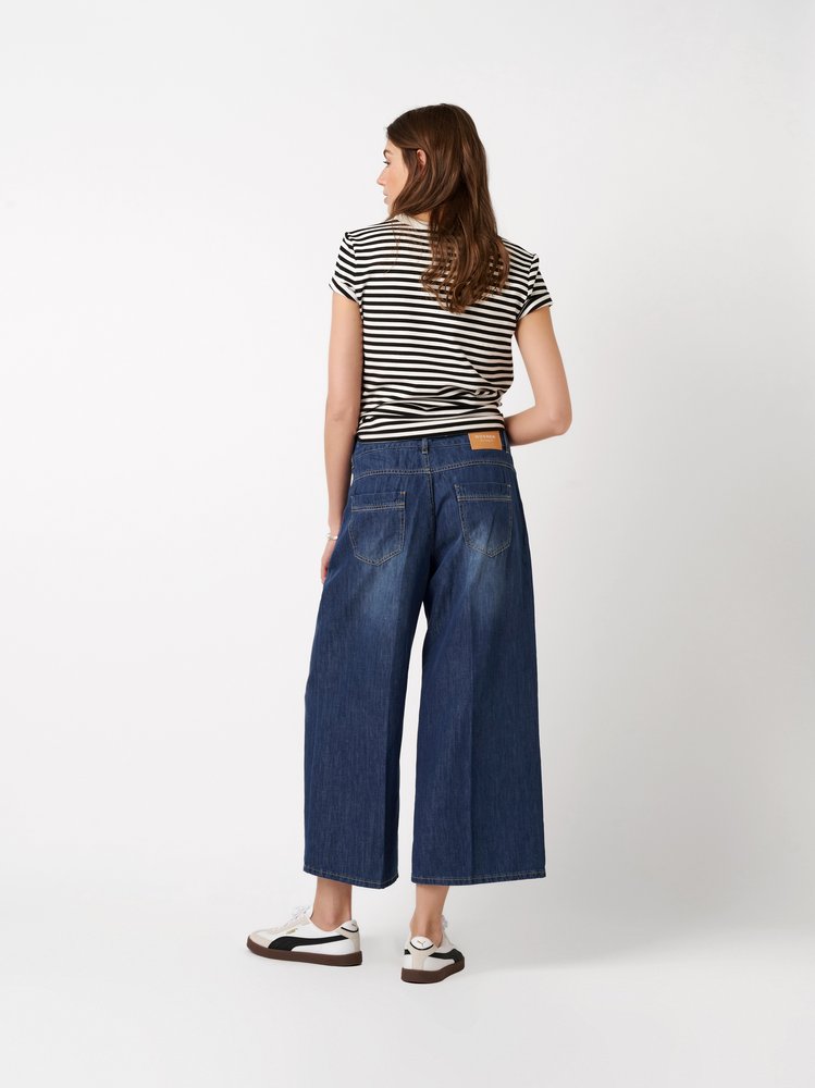 Womens jeans Masha Culotte in mid blue, summery denim culottes, back view worn by model