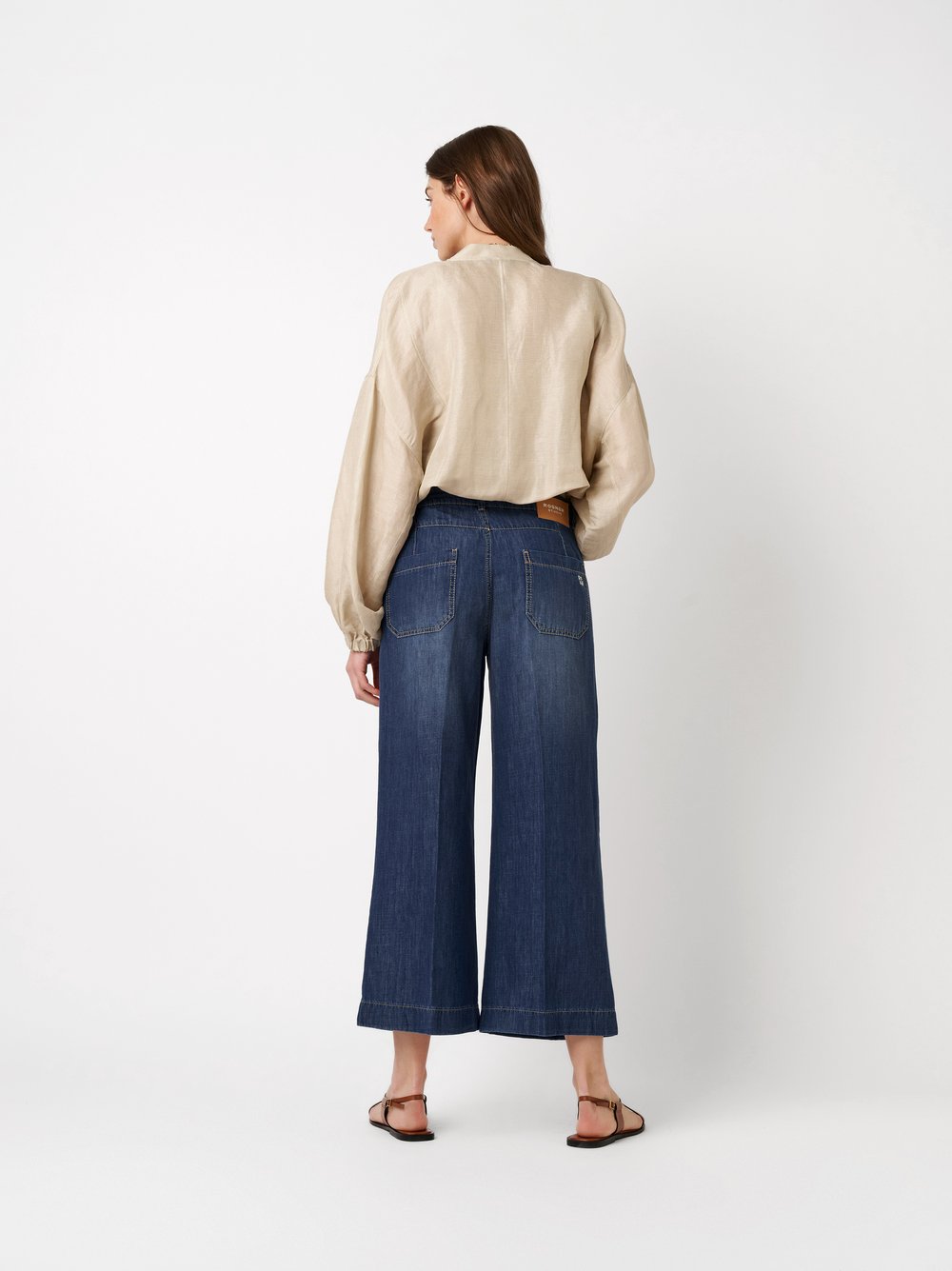 Womens jeans Audrey Culotte in mid blue, culottes made of lightweight denim, back view worn by model