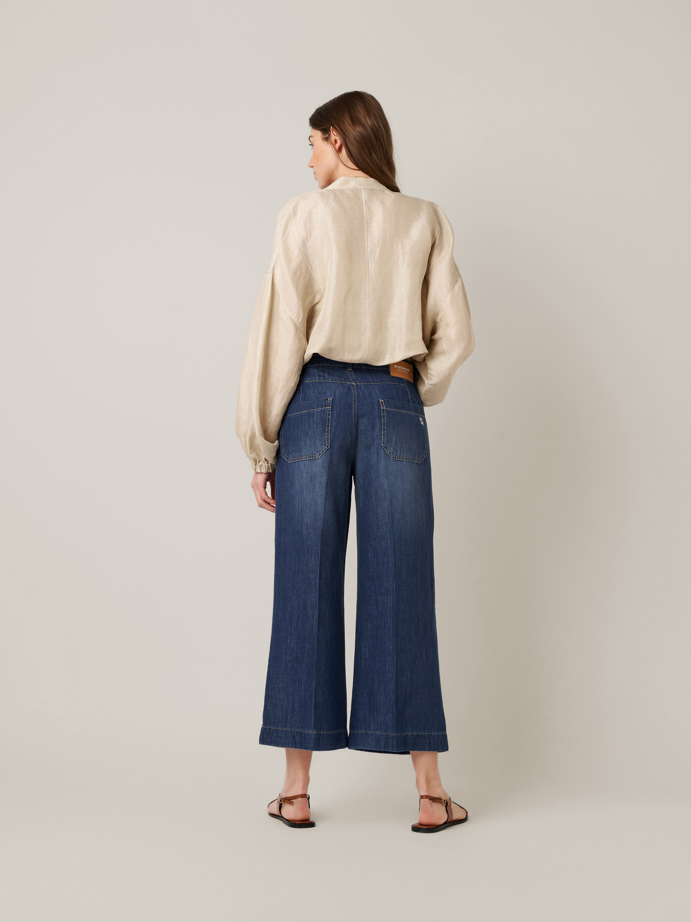 Womens jeans Audrey Culotte in mid blue, culottes made of lightweight denim, back view worn by model