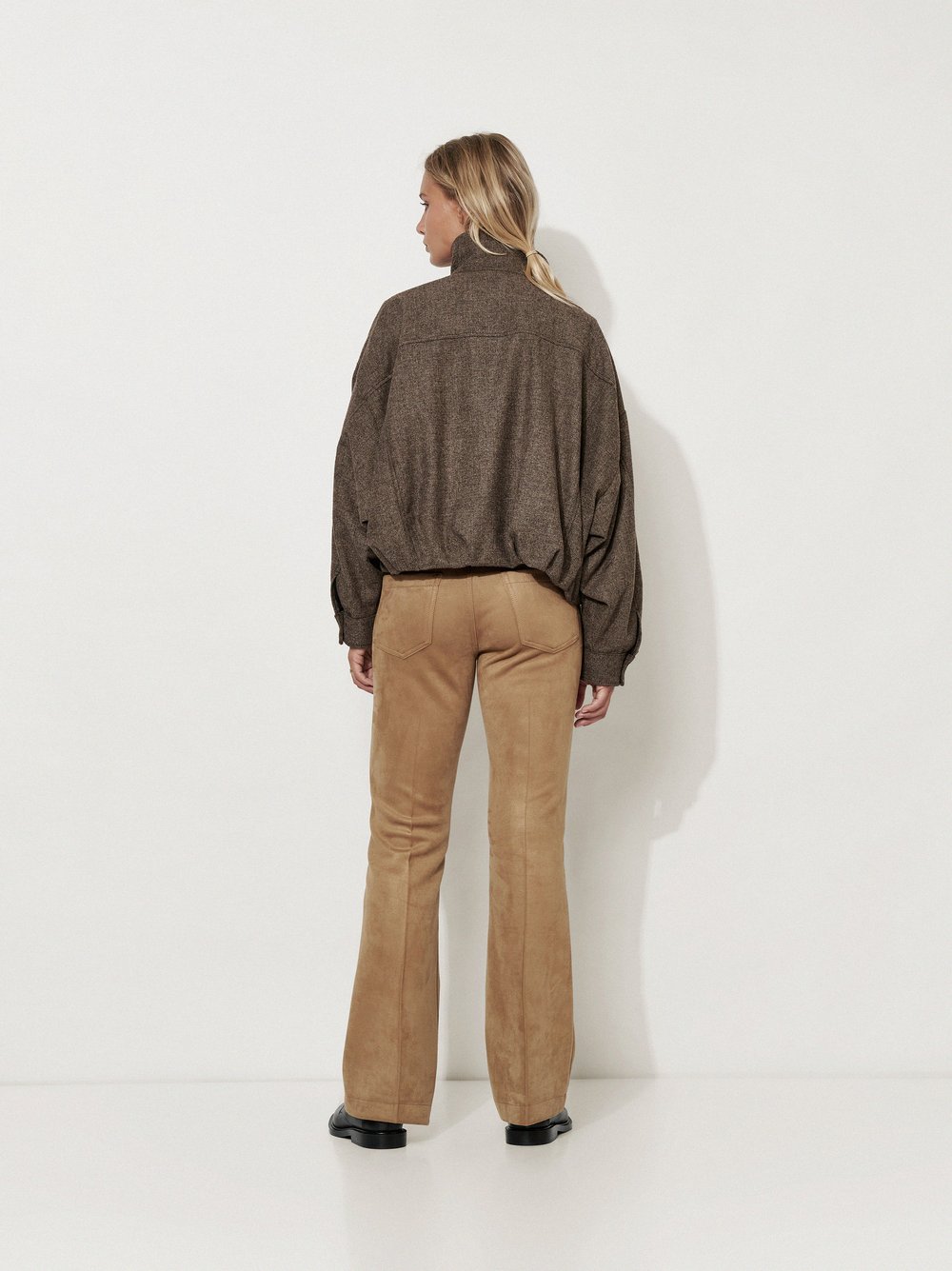 Womens trousers Antonia Bootcut in Camel, bootcut trousers in suede look, back view worn by model
