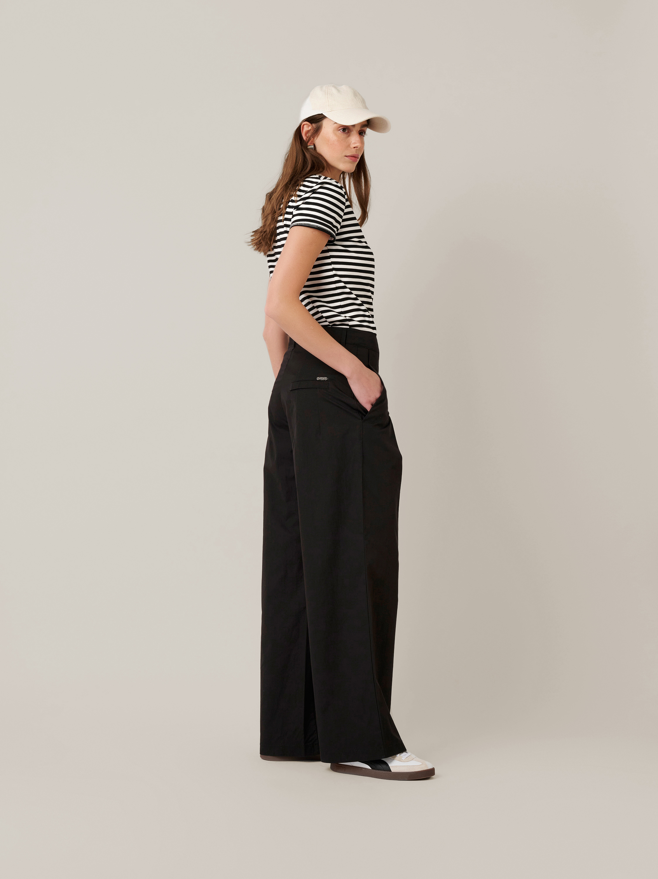 Womens trousers Mara Wide in black, wide-leg trousers made of papertouch cotton, outfit view worn by model
