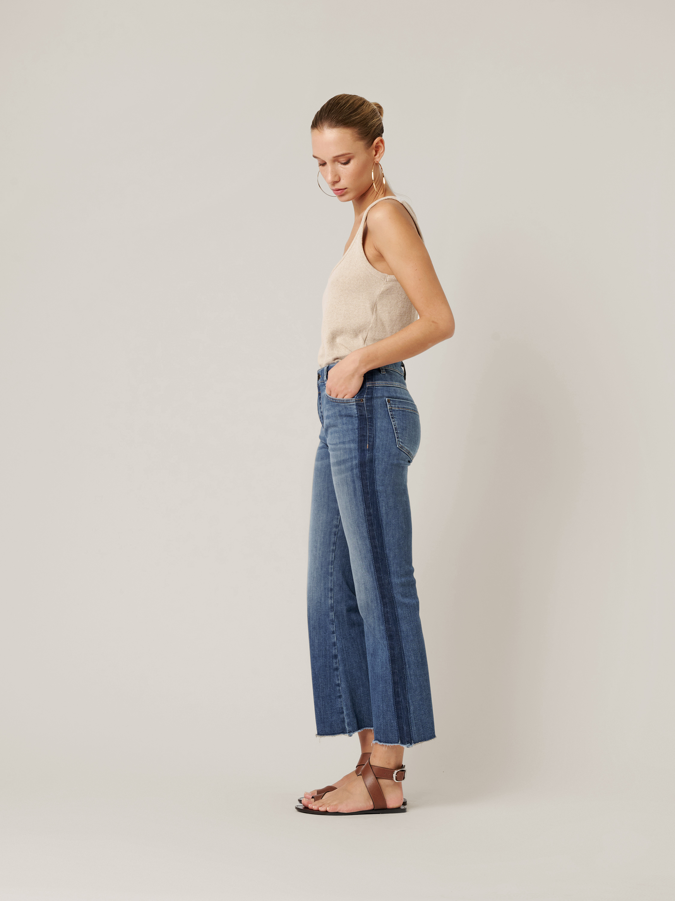 Womens jeans Antonia Bootcut in mid blue, jeans with raw hems and side stripes, outfit view worn by model