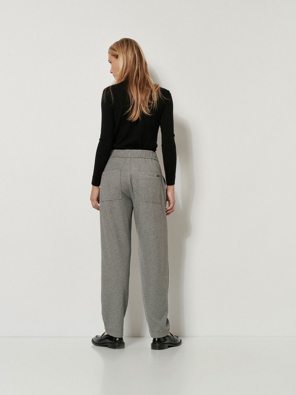 Womens trousers Mara Tapered in Light Grey, soft jersey tapered-fit trousers, back view worn by model