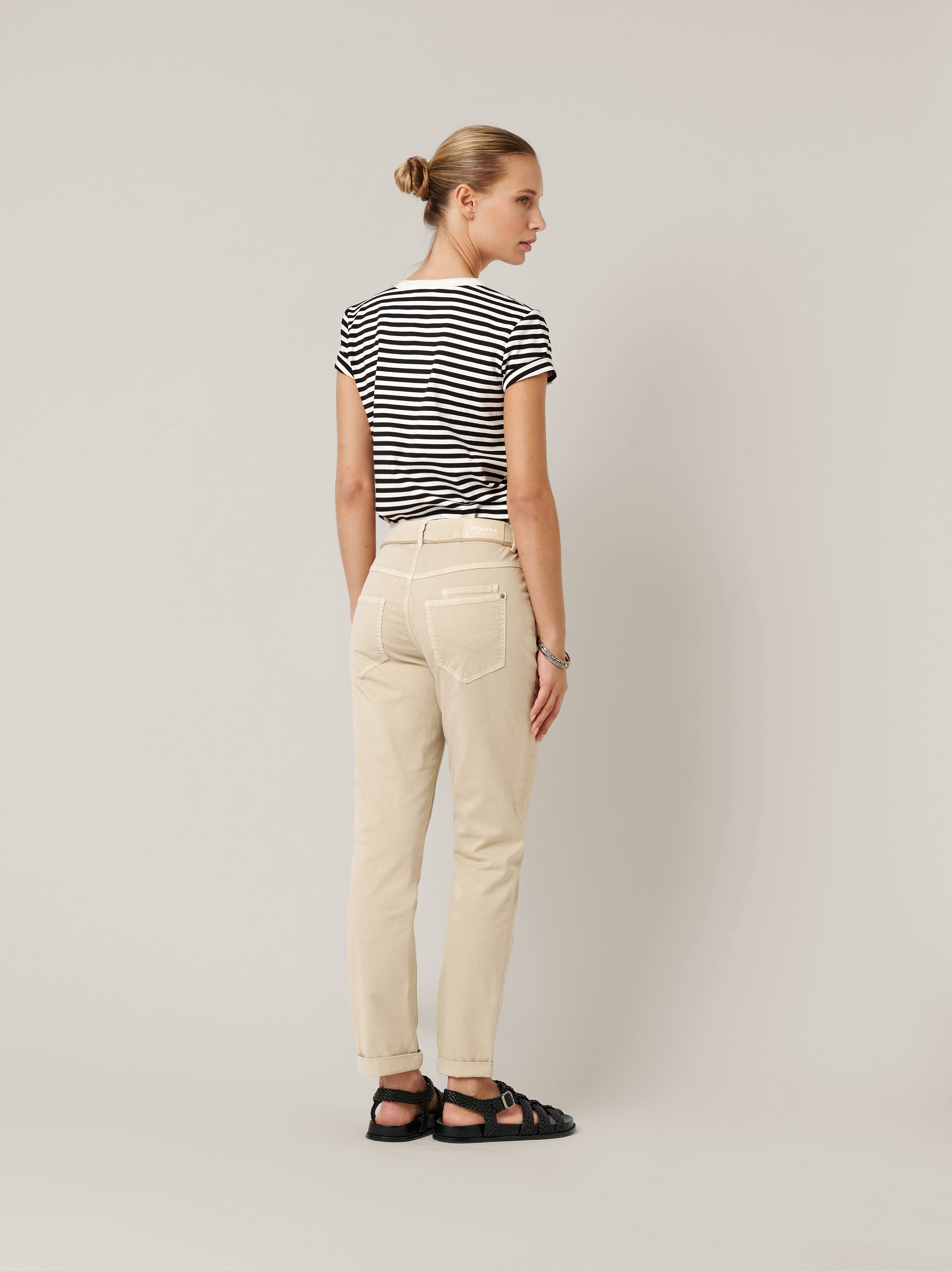 Womens jeans Masha Belt in sand, summer trousers with tie belt and turn-up hem, back view worn by model