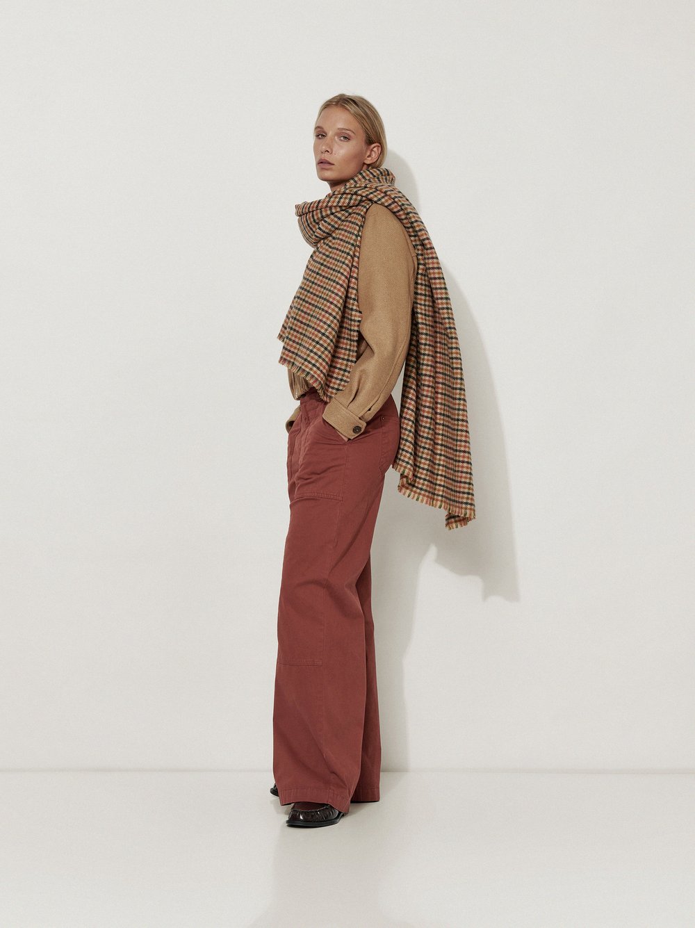 Womens trousers Mara Wide in Rust, wide-leg worker trousers, front view worn by model