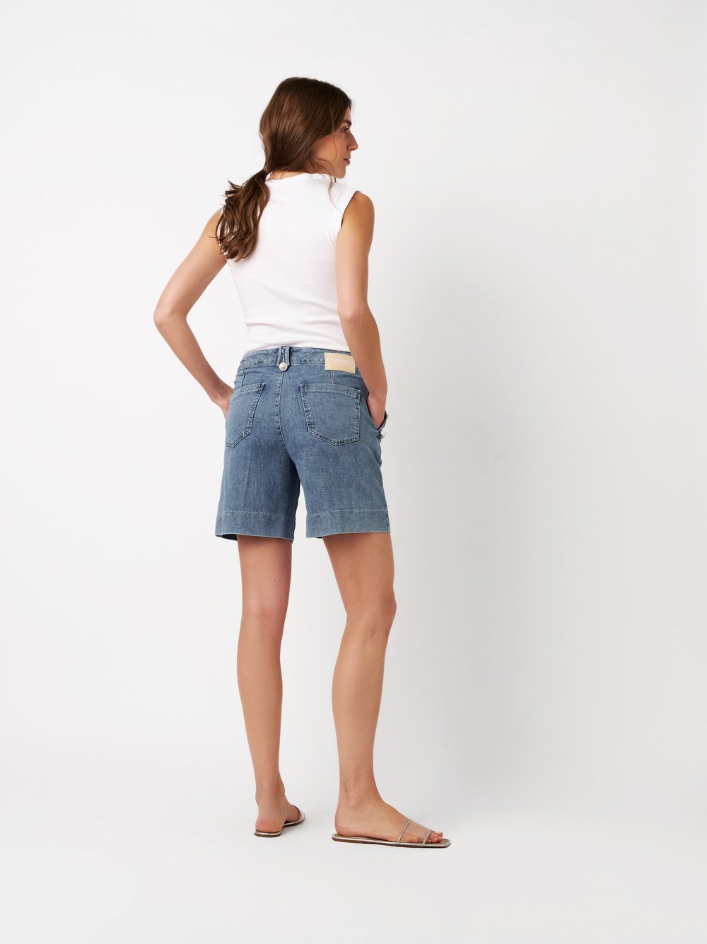 Womens shorts Mara Shorts in light blue, denim shorts with framed pockets, back view worn by model