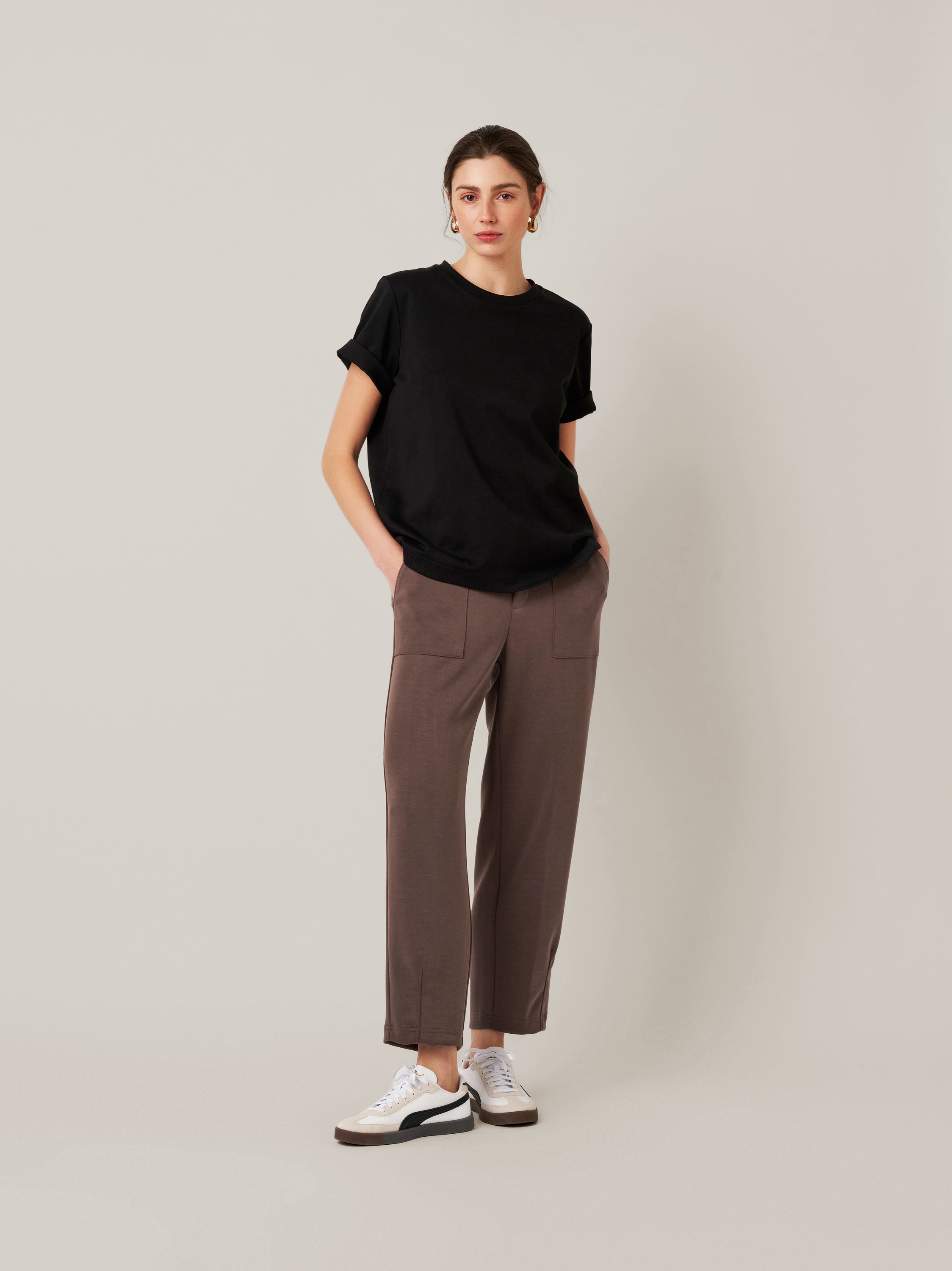 Womens trousers Mara Tapered in brown, tapered-fit trousers made of scuba, front view worn by model