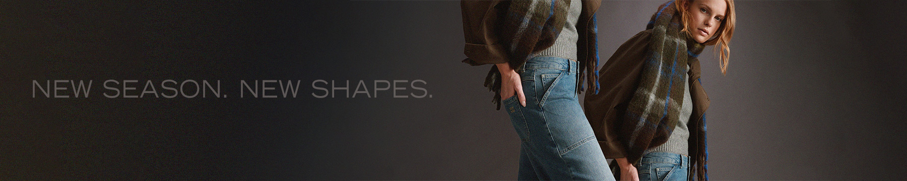 Frauen in herbstlichen Looks mit blauen Jeans und großen karierten Schals – Teaser zur Kategorie New