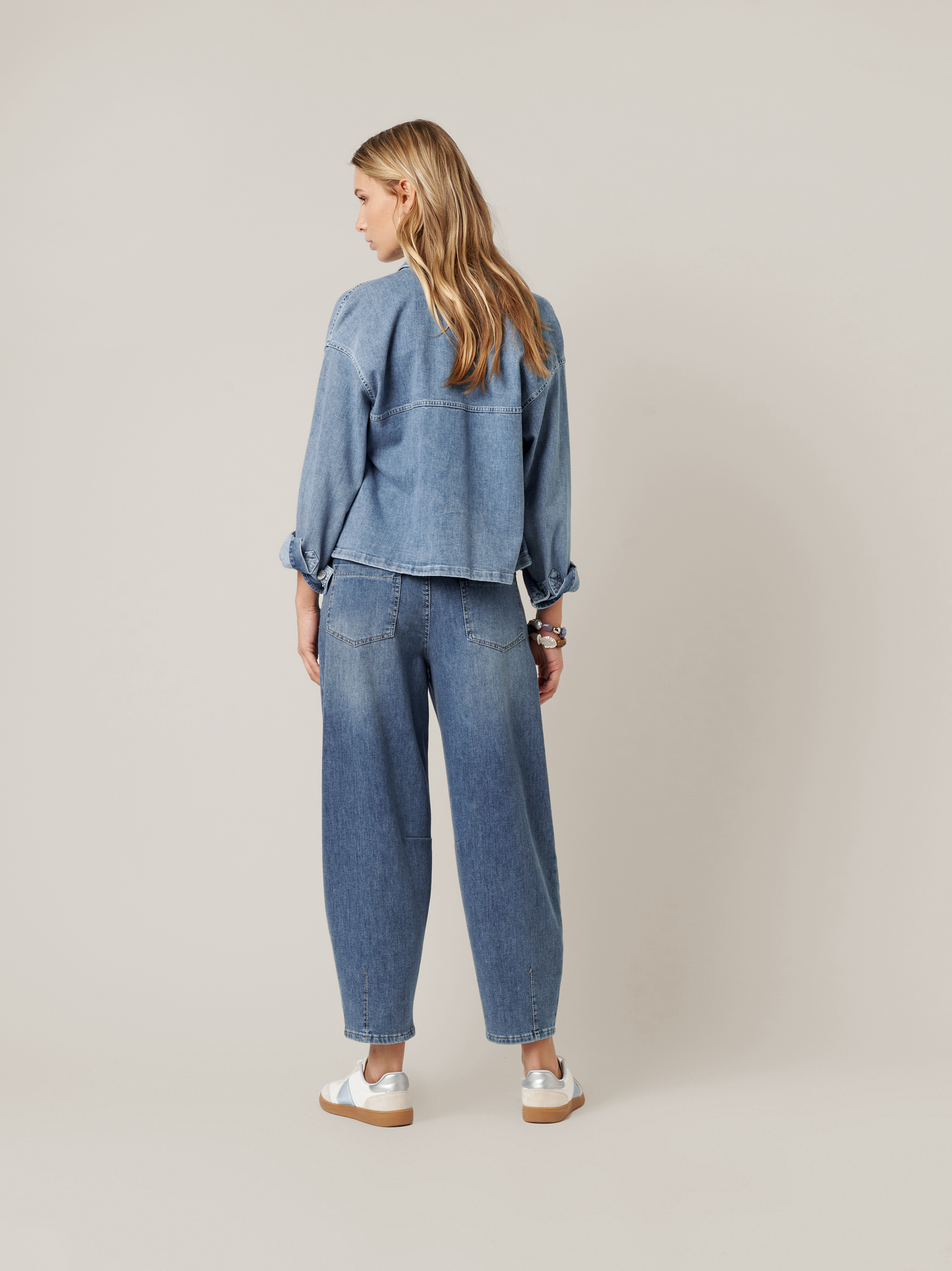 Womens jacket Jamie in bleached blue, short jacket made of denim, back view worn by model