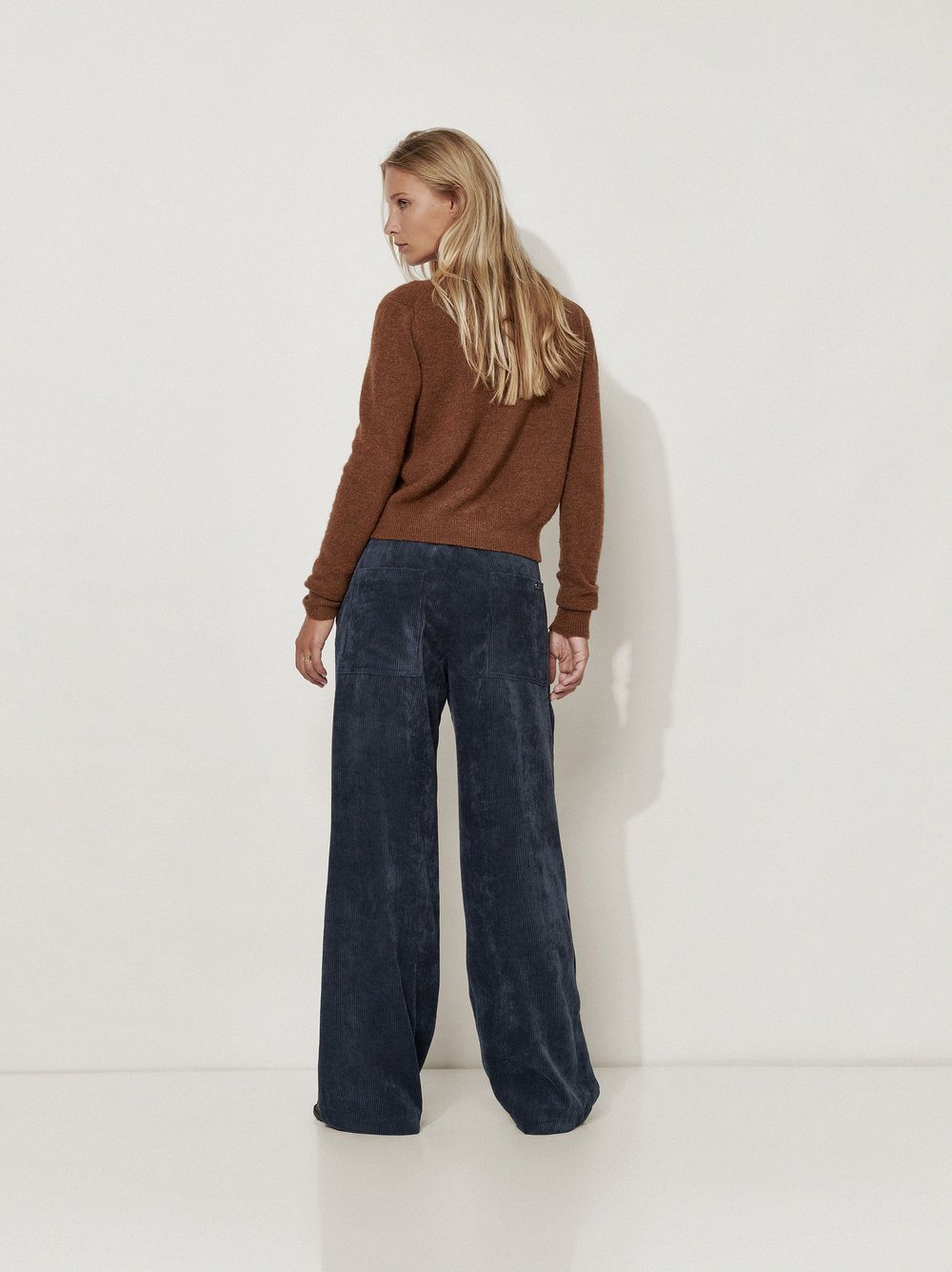 Womens trousers Mara Worker in Navy, wide-leg corduroy trousers, back view worn by model